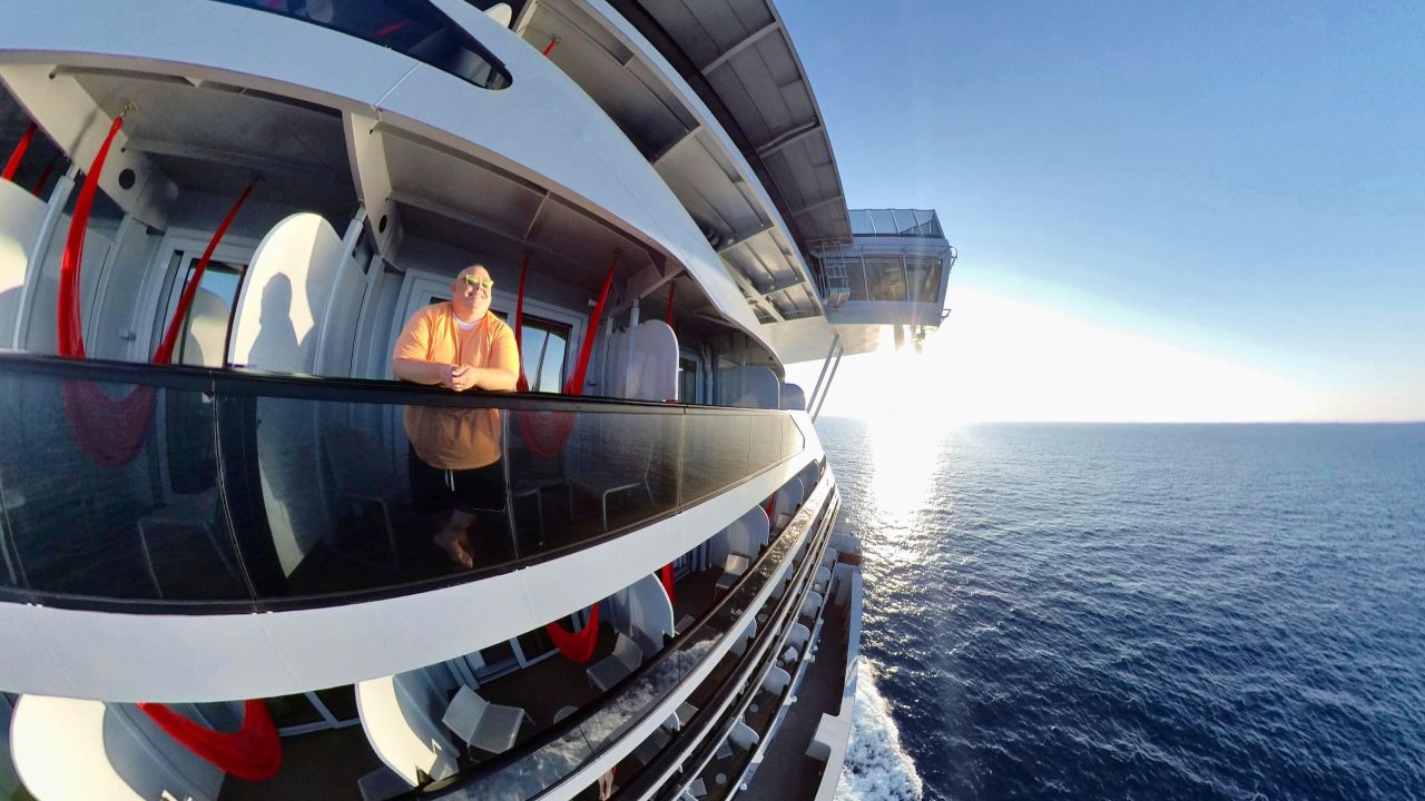 James Hills from Flow Voyages taking a photo on Virgin Voyages cruise