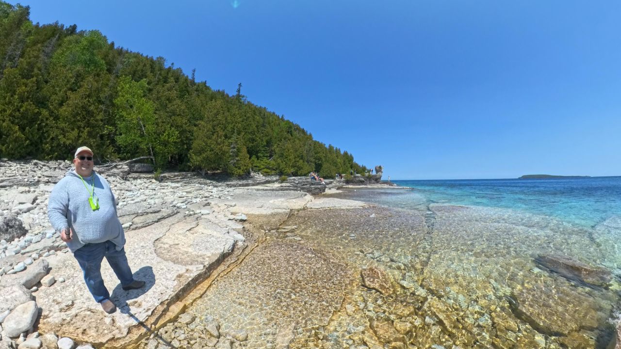 james standing on flower pot island ontario on great lakes cruise