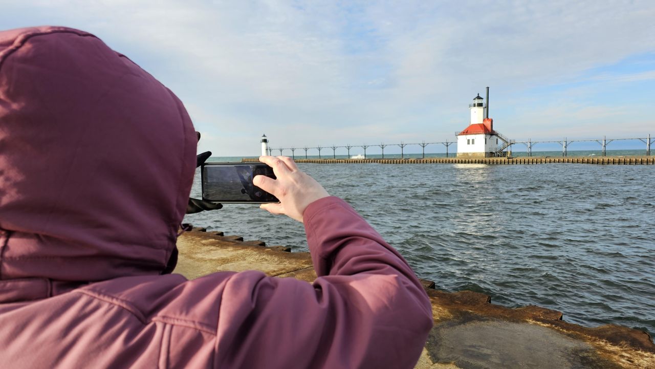 Heather Hills taking a photo for a blog post